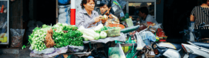 Selling vegetables in a market